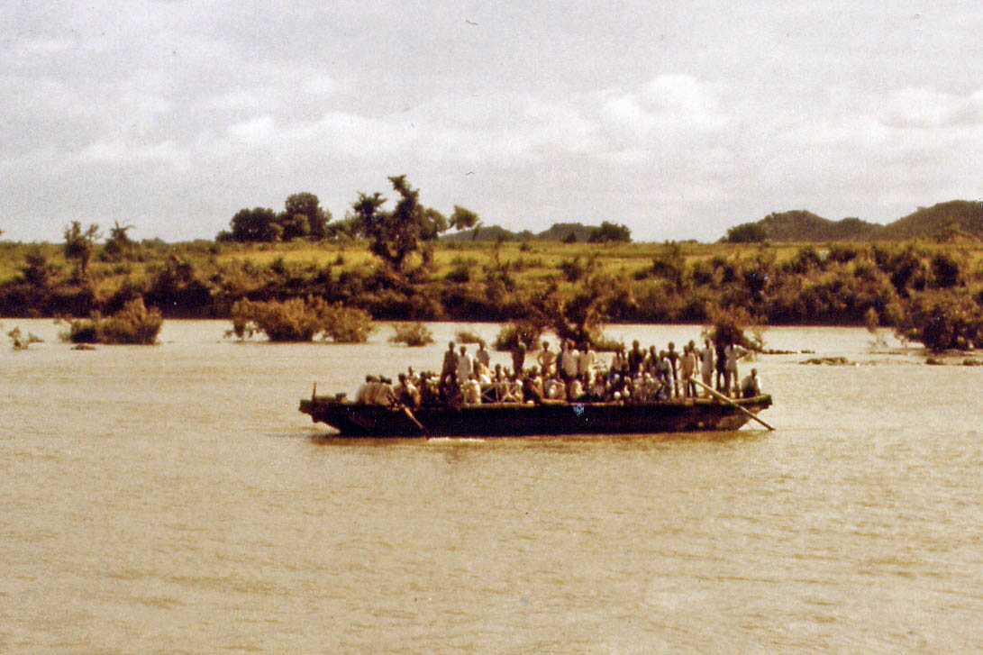 Transport by boat after the street was flooded